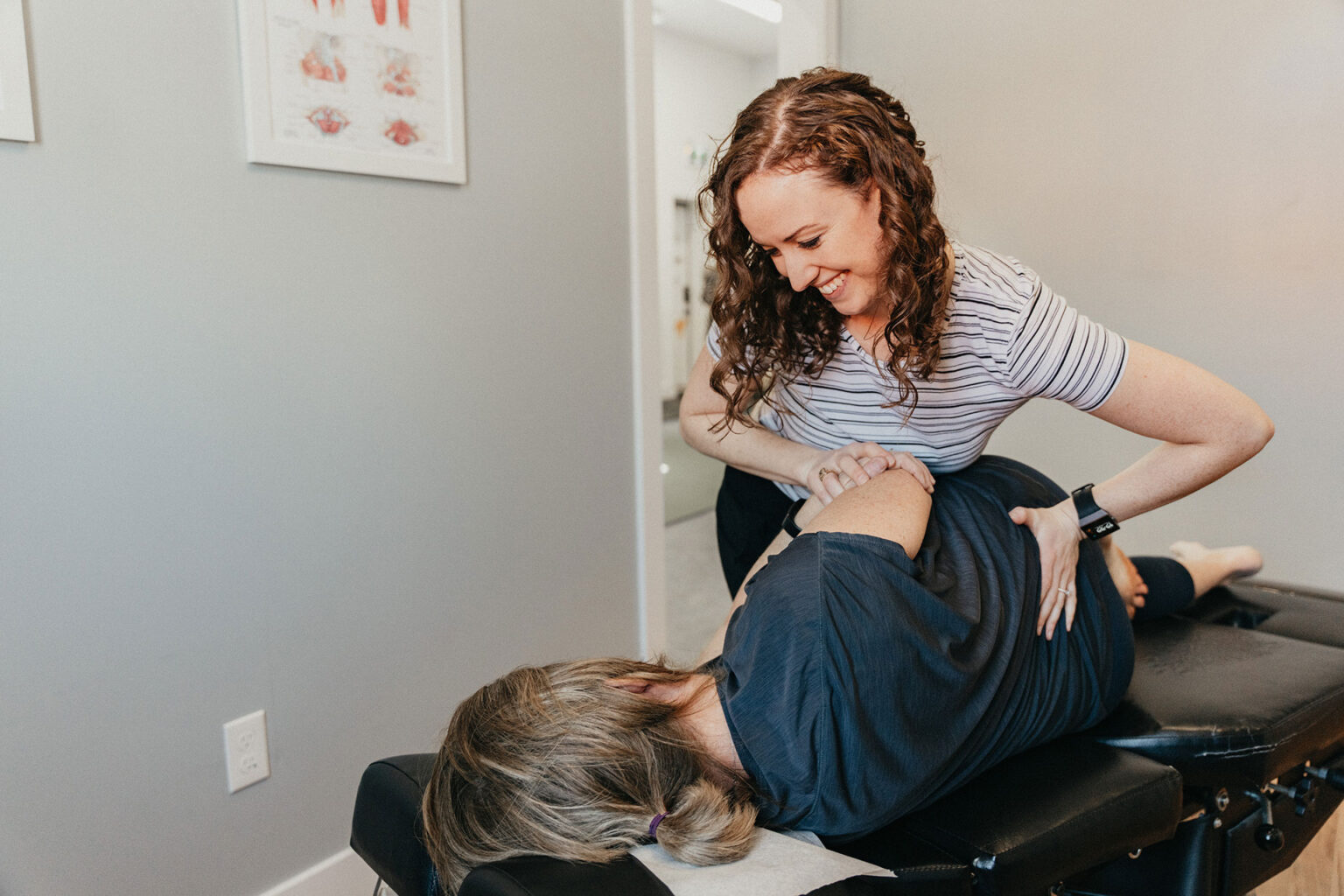 Maggie-performing-a-chiropractic-service-on-a-client