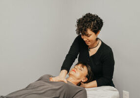 Dr. Megan performing Osteopathy on a client